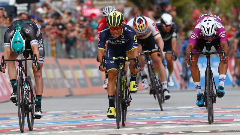 Sam Bennett (left) was beaten on the line in the Giro again. Caleb Ewan (centre) won
