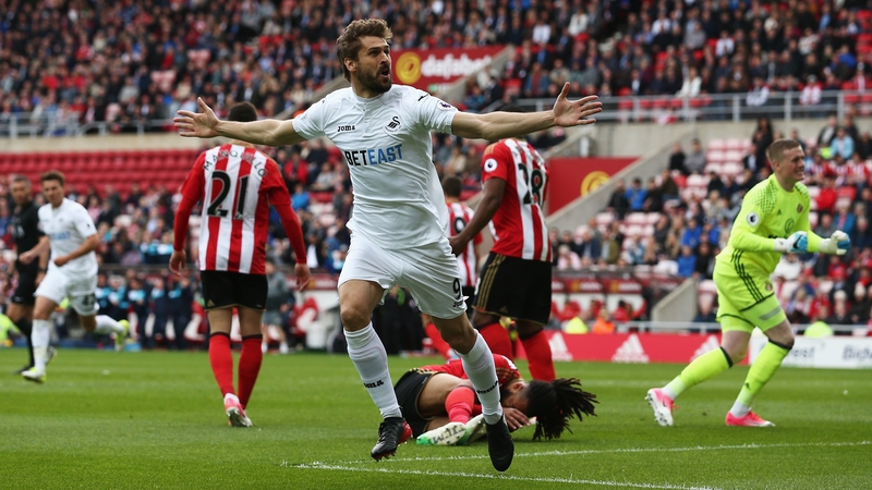 Fernando Llorente wheels away after heading Swansea in front