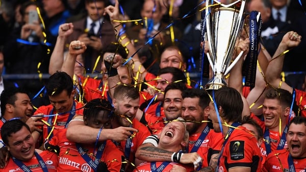 Saracens hoist the trophy aloft after beating Clermont