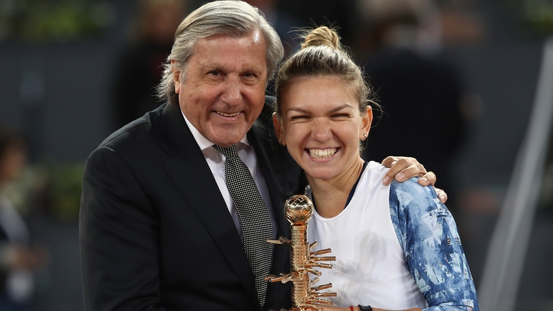 Madrid Open winner Simona Halep of Romania and Ille Nastas