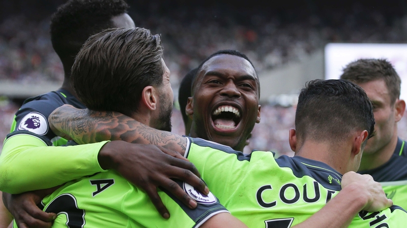 Liverpool celebrate Philippe Coutinho's second goal - their third - at West Ham