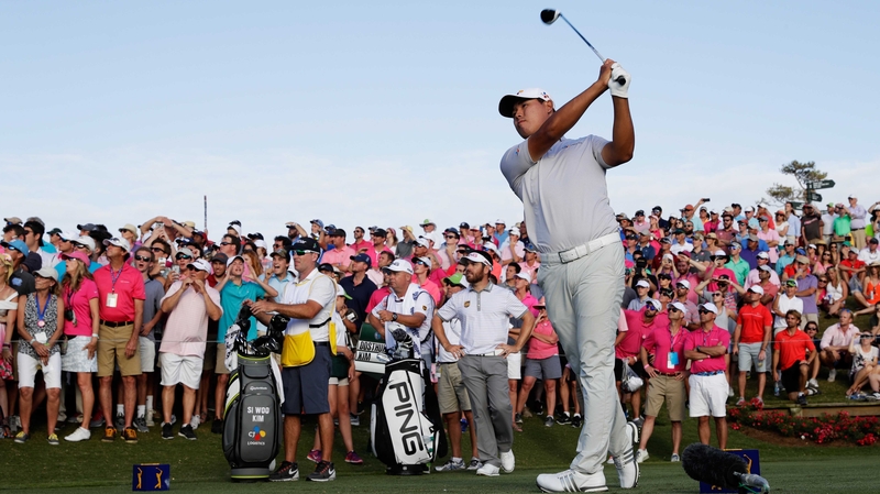 Si Woo Kim tees off on the 18th at Sawgrass on his way to victory