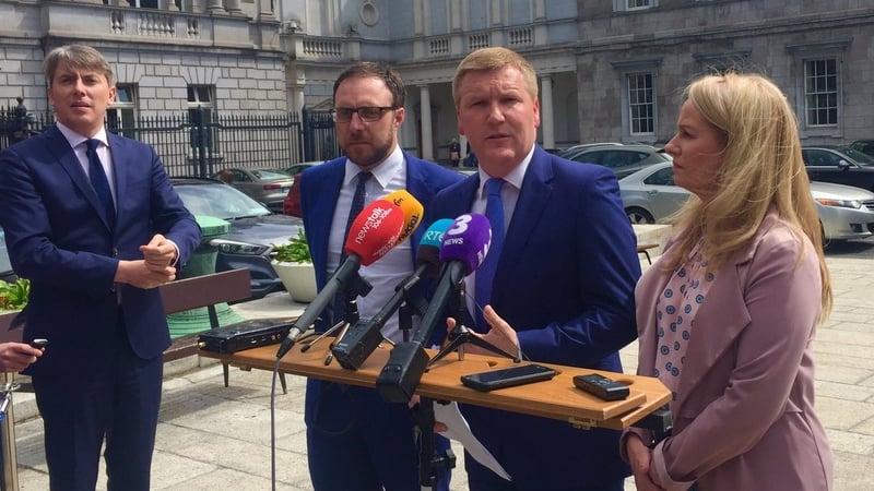 Michael McGrath (third from left) said garda controversies have destabilised the Government