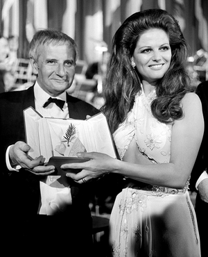 The star of this year, the mesmerizing Claudia Cardinale in 1969 in a cut out dress and big hairstyle.