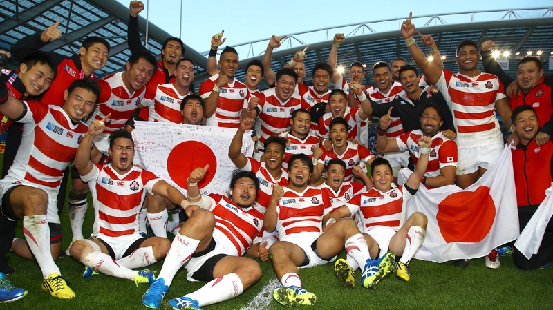 Japan celebrate their famous defeat of South Africa at the 2015 World Cup