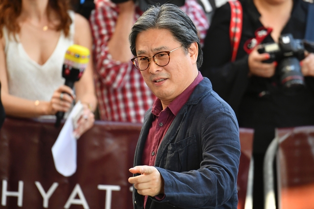 Day One - Wednesday May 17:
South Korean director, writer, producer and member of jury Park Chan-Wook looking super classy this morning.
