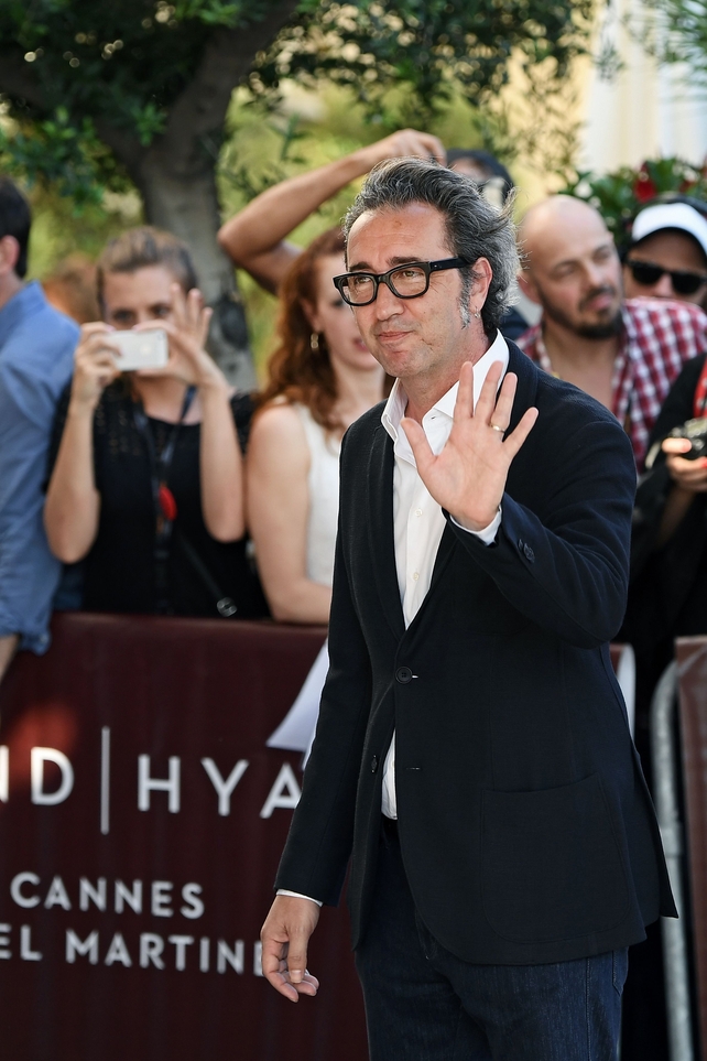 Day One - Wednesday May 17:
Italian director, script writer and member of the jury Paolo Sorrentino has arrived to the red carpet looking very dapper.