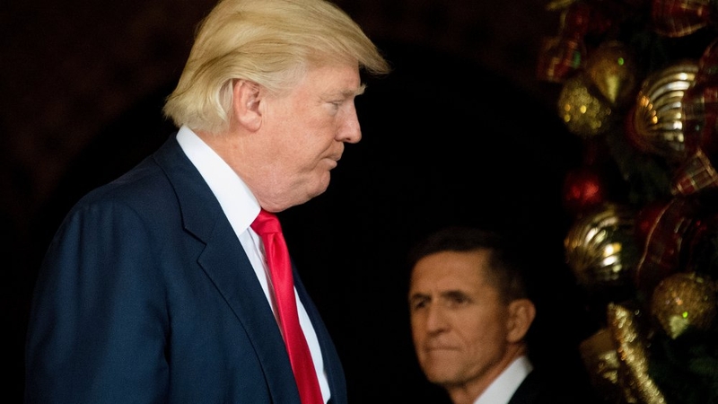 Donald Trump pictured with his former national security adviser Michael Flynn