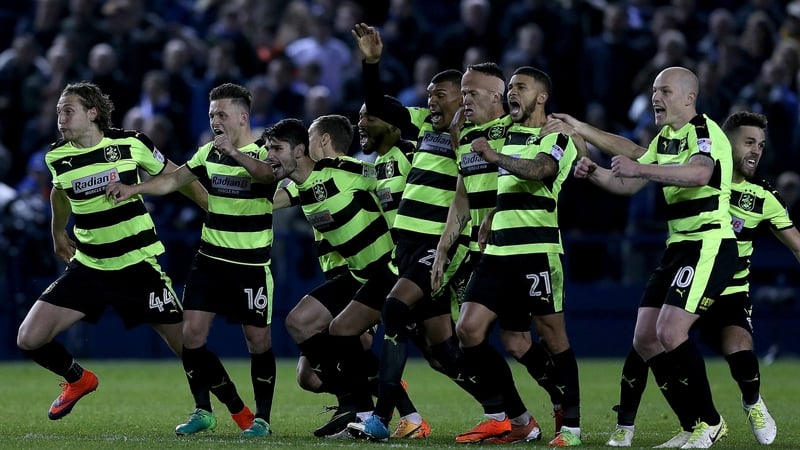 Huddersfield Town players celebrate at the full-time whistle