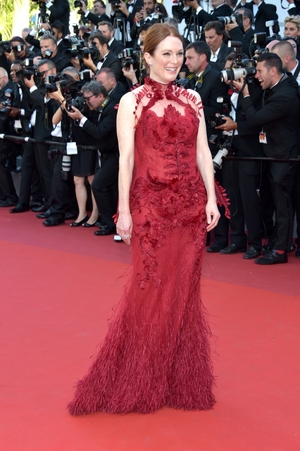 Day One - Wednesday May 17:
Julianne Moore looked utterly beautiful in red in this Givenchy Couture floral gown.