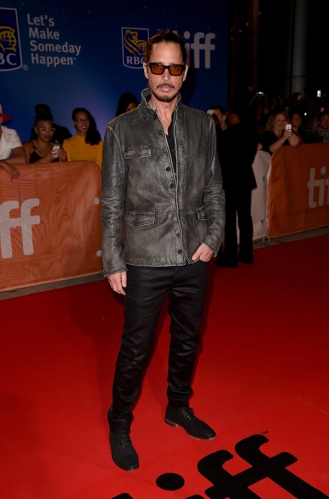 Chris Cornell attended the premiere of 'The Promise' at the 2016 Toronto International Film Festival wearing Bono-esque sunglasses and simple grey jacket.