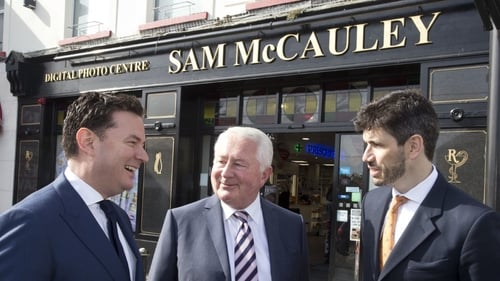 Ian Daly from Cardinal Capital Group, Sam McCauley and Jonathan Cosgrave, from the Carlyle Group at today's investment announcement