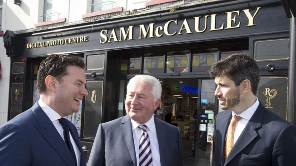 Ian Daly from Cardinal Capital Group, Sam McCauley and Jonathan Cosgrave, from the Carlyle Group at today's investment announcement