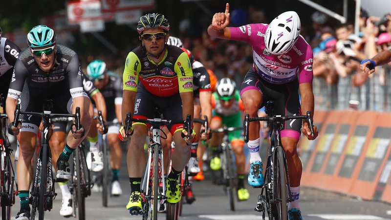 Fernando Gaviria surges to the line as Sam Bennett (L) finishes third in Reggio Emilia