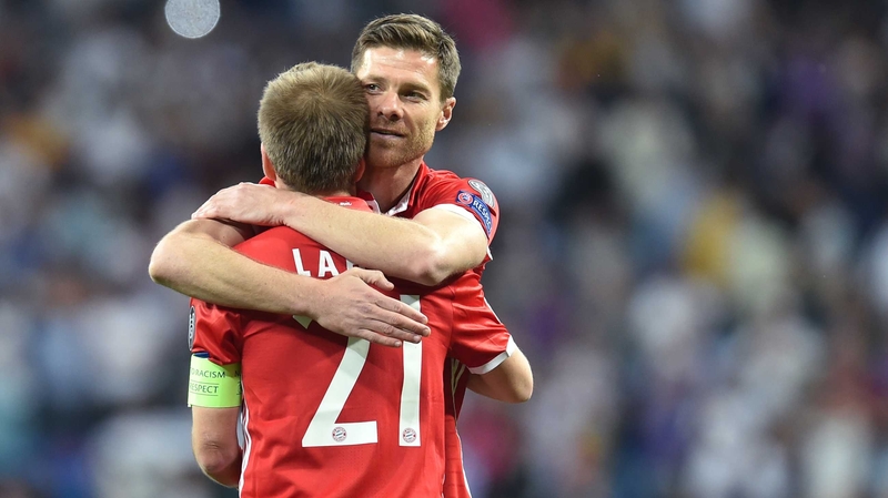 Xabi Alonso embraces Philipp Lamhm