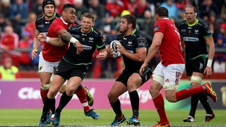 Munster's Francis Saili tackles Ospreys' Dan Biggar