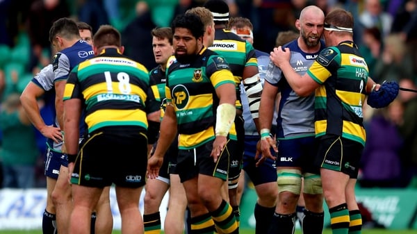 Northampton's Dylan Hartley consoles John Muldoon of Connacht after the game