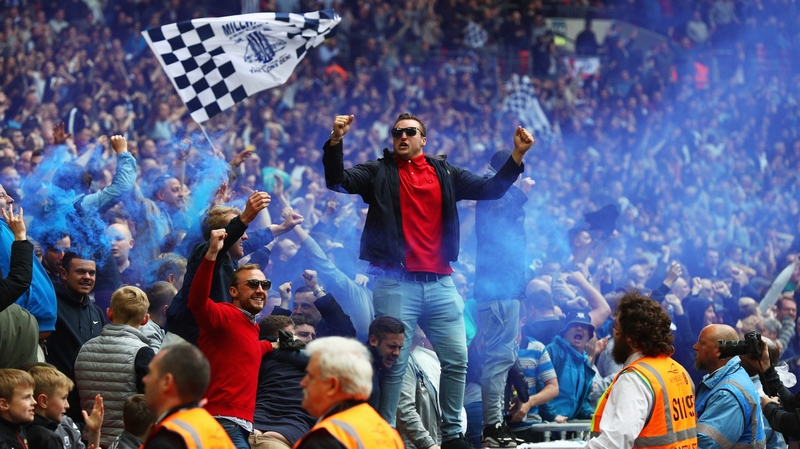 Millwall fans celebrate their promotion