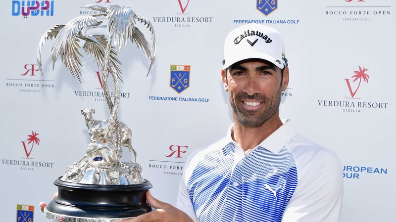 Alvaro Quiros with the trophy