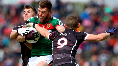 Sligo's Patrick O'Connor and Adrian McIntyre with Seamus O'Shea of Mayo