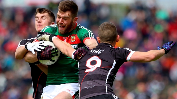 Sligo's Patrick O'Connor and Adrian McIntyre with Seamus O'Shea of Mayo