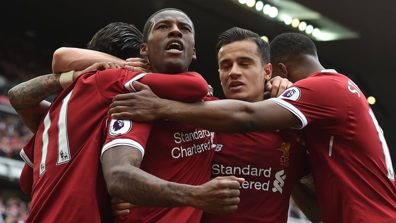 Liverpool players celebrate with Georginio Wijnaldum after he broke the deadlock.