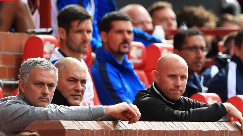 Jose Mourinho (L) watches his side beat Crystal Palace