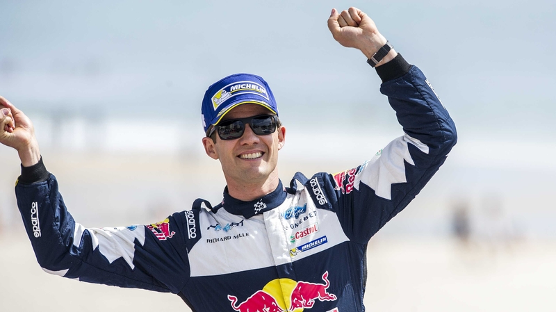 Sebastien Ogier celebrates his win