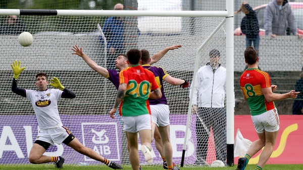 Brendan Murphy (8) slots home Carlow's second goal
