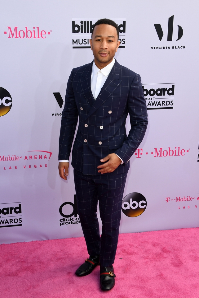 Styled by UK stylist David Thomas, singer John Legend wore Gucci on the pink carpet.