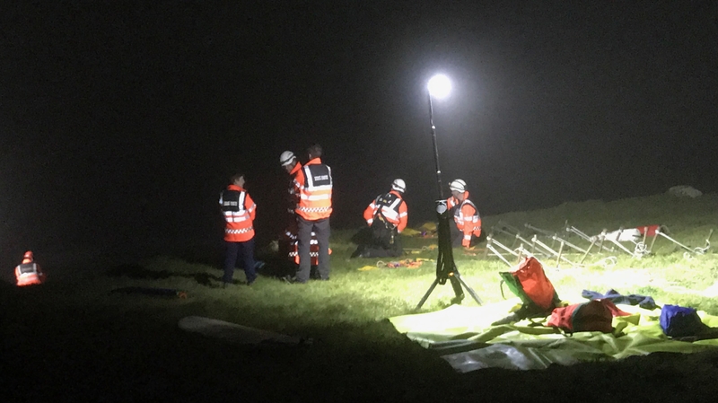 Rescue team prepares to drop down to surfer beneath cliffs (Pic: Mike O'Shea, Dingle Coastguard)