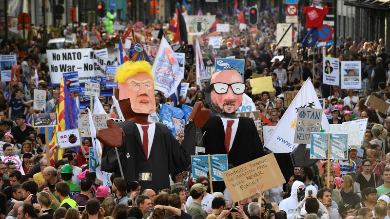 Thousands took to the streets of Brussels in protest against Mr Trump's visit