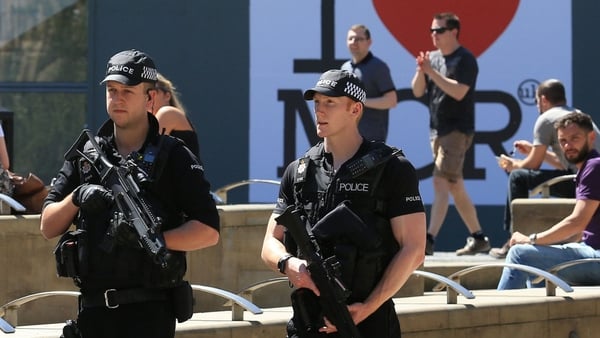 Armed police maintain a visible presence on Manchester's streets