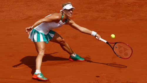Kerber is the first top seed to lose in her opening match at Roland Garros in the Open era