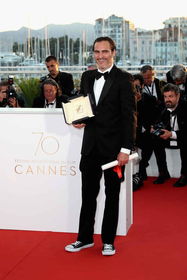 Closing Ceremony Sunday May 28:
Joaquin Phoenix is the coolest wearing sneakers and a tuxedo to receive his prize for the Best performance by an actor for his role in 'You Were Never Really Here'.