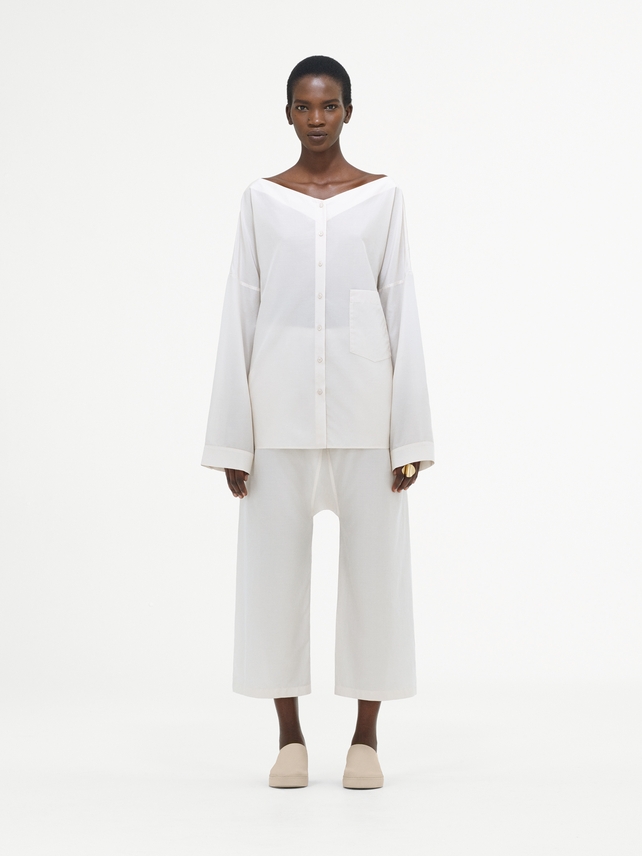 White and loose is the perfect combo from COS. We love this refined style, especially the Bardot shoulders of the top.