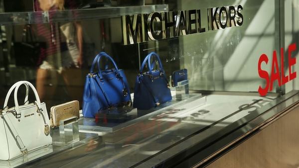 Rising prices have had little impact on middle and high-income households who have been happily spending on designer labels