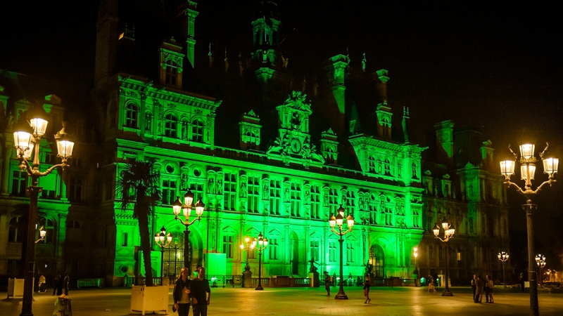 Paris City Hall illuminated in green in response to Donald Trump's move