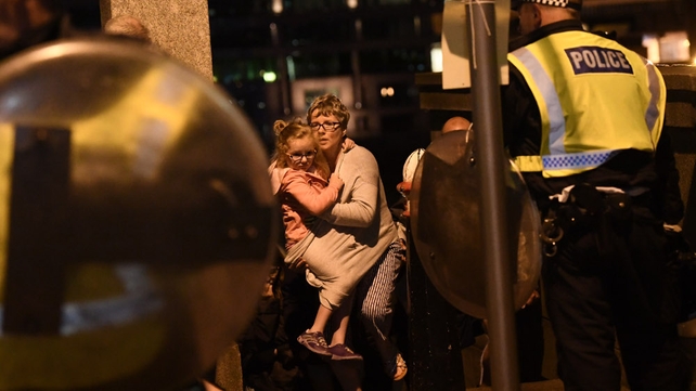 A young child is comforted as the incident unfolded