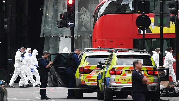 British police and forensics teams at work close to Borough Market