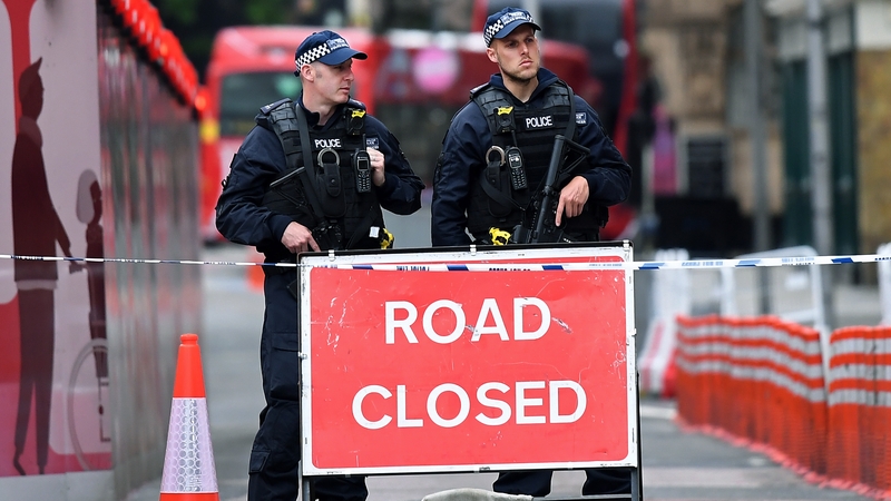 Armed police guard a closed road near Borough Market