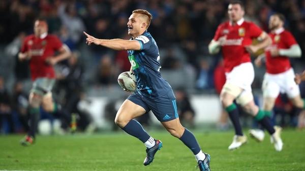 Ihaia West celebrates scoring the winning try