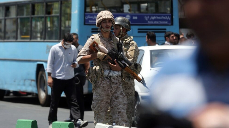 Iranian army soldiers patrol near the parliament building