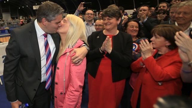 Gavin Robinson of the DUP celebrates by kissing his wife after winning his Westminster seat