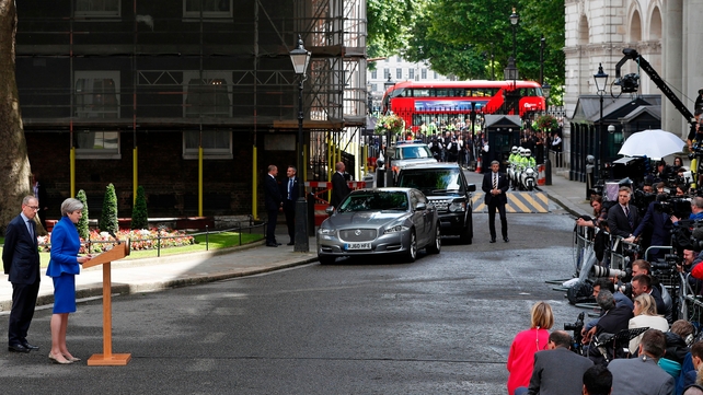 Theresa May announcing that she will form a new UK government with the support of the DUP