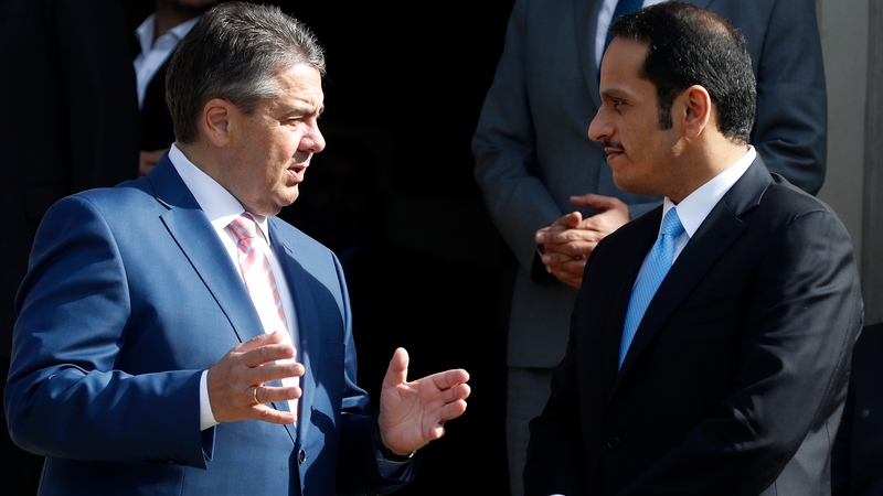 Germany's Foreign Minister Sigmar Gabriel talks with the Foreign Minister of Qatar, Sheikh Mohammed al-Thani