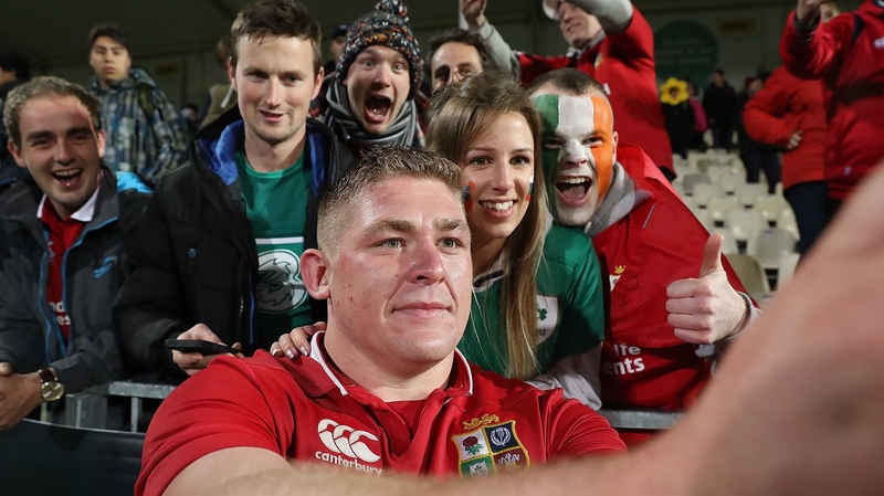 Tadgh Furlong poses for a selfie with fans