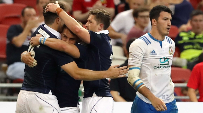 Damien Hoyland (second left) celebrates his try