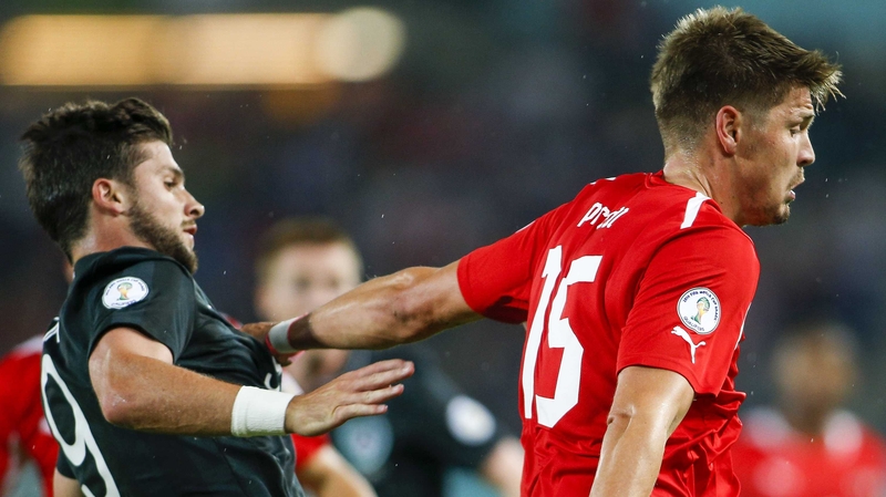 Sebastien Prodl, in action here against Shane Long, is in line to win his 51st international cap at the Aviva Stadium