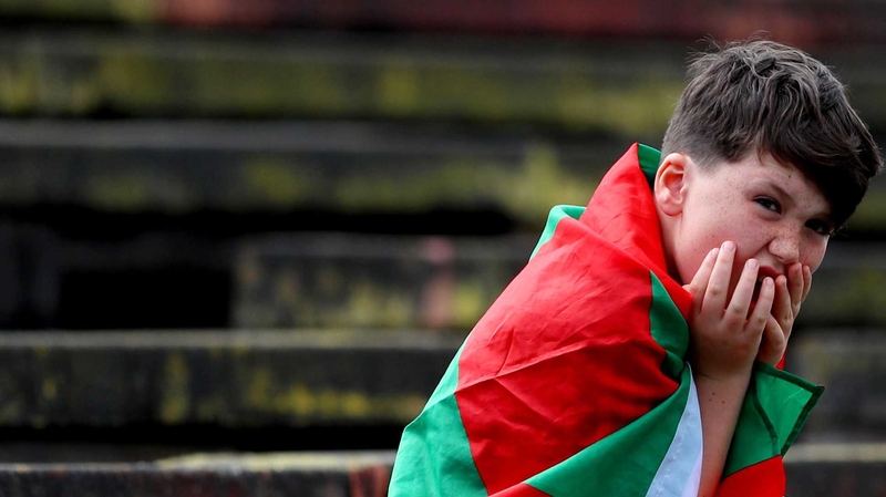 A young Mayo fan looks on from the terraces.